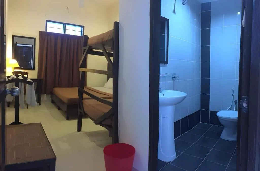 Bed in Perhentian Tivoli Inn