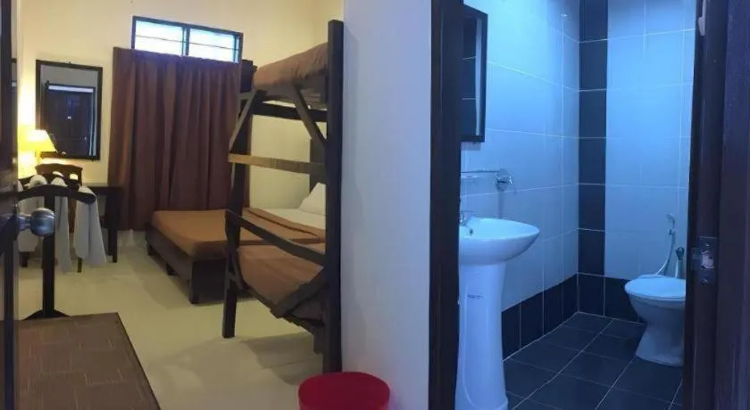 Bed in Perhentian Tivoli Inn