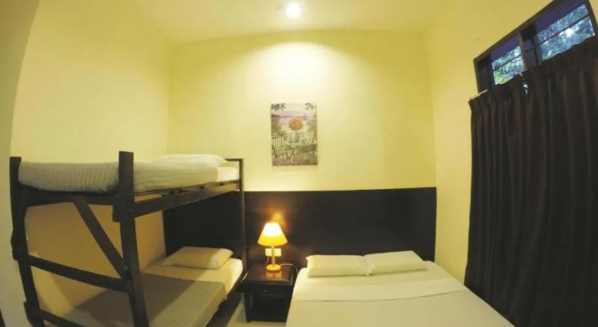 Bed in Perhentian Tivoli Inn