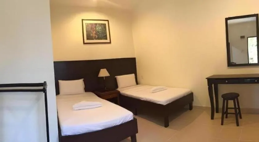 Bed in Perhentian Tivoli Inn