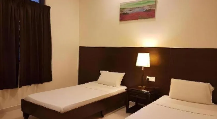 Bed in Perhentian Tivoli Inn