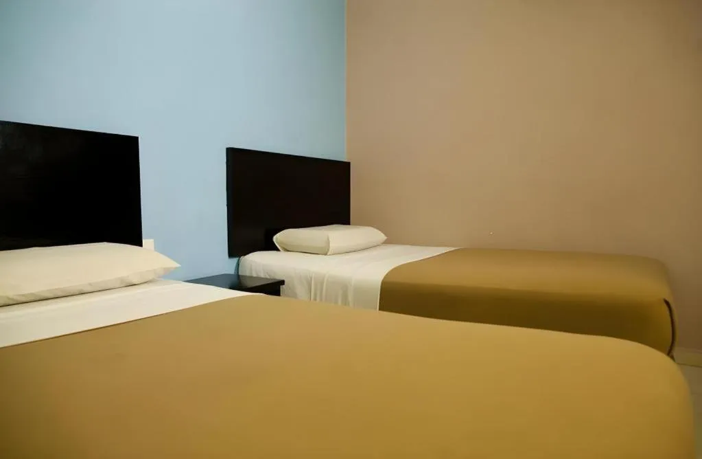 Bed in Hotel Ria