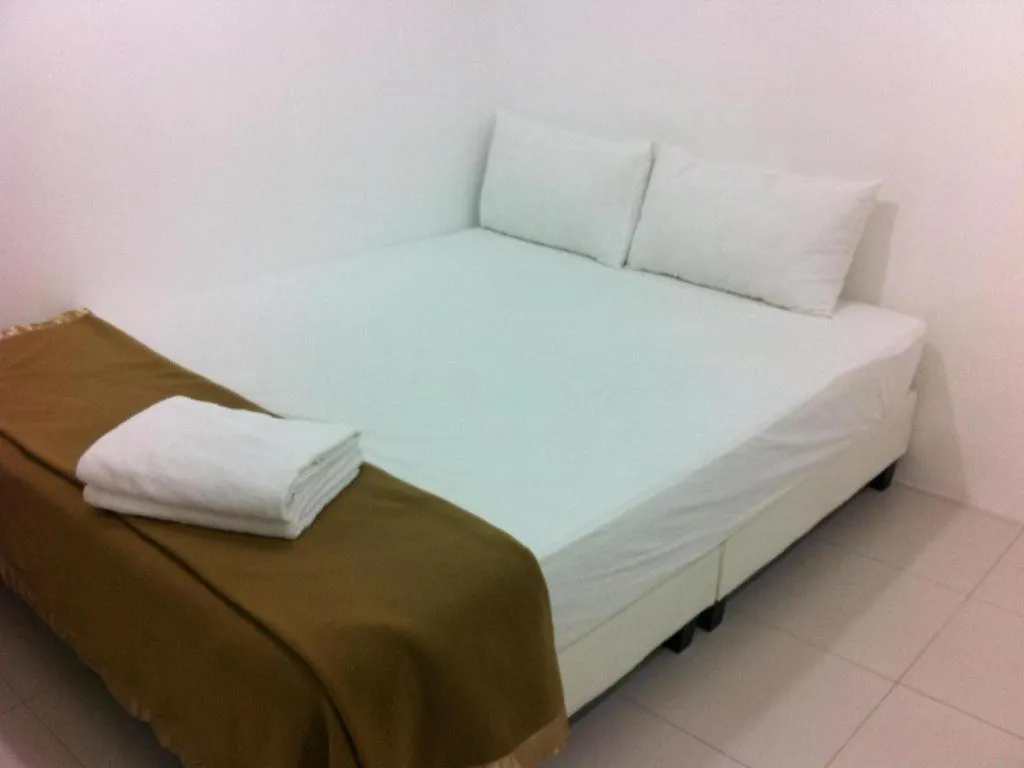 Bed in Chin Yee Hotel