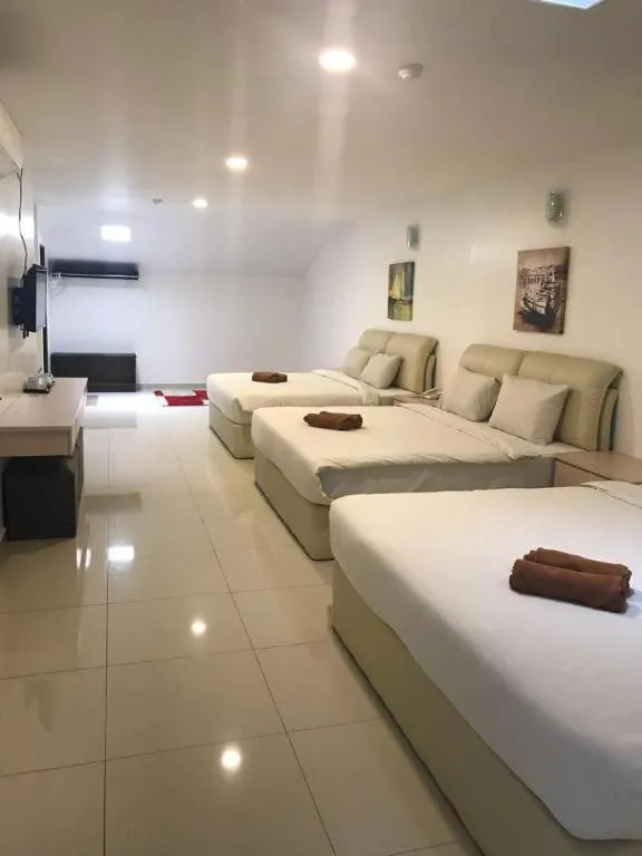 Bed in Peach Hill Hotel & Cafe