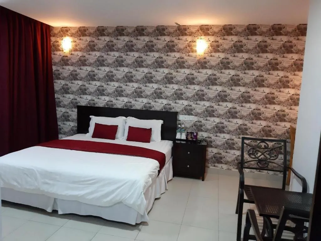 Bed in Loong Fatt Hotel