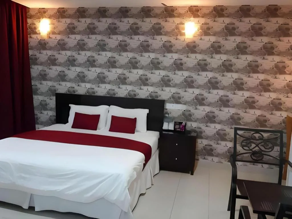 Bed in Loong Fatt Hotel