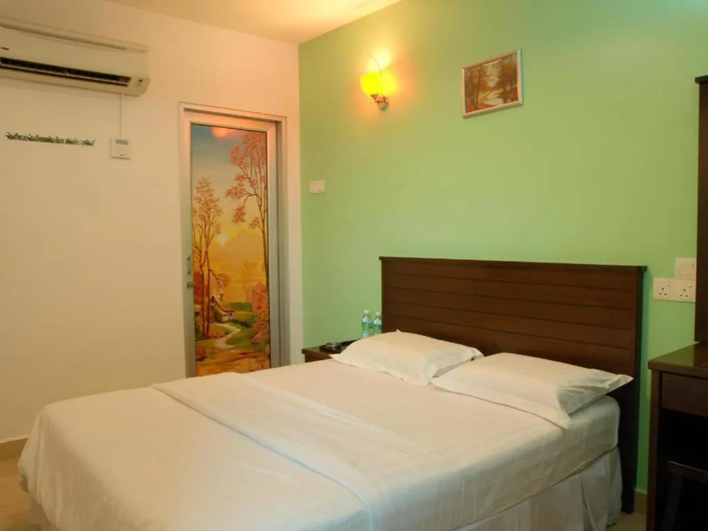 Bed in Loong Fatt Hotel