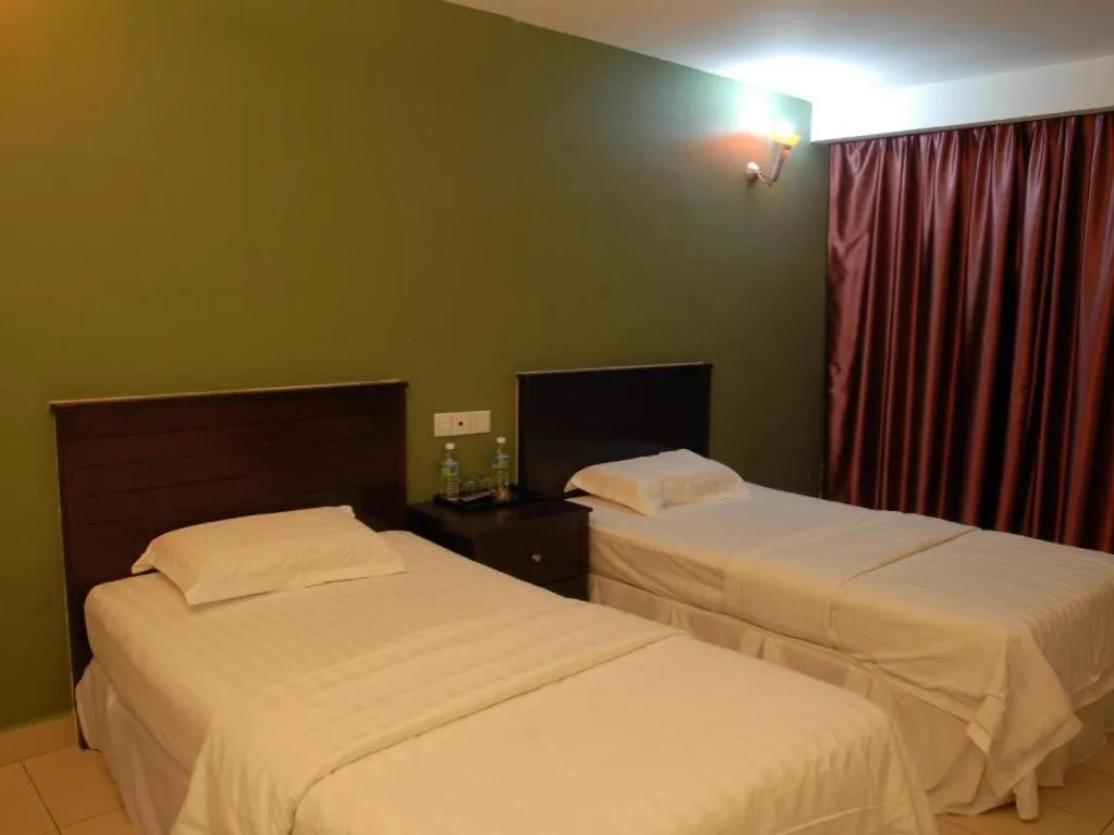 Bed in Loong Fatt Hotel