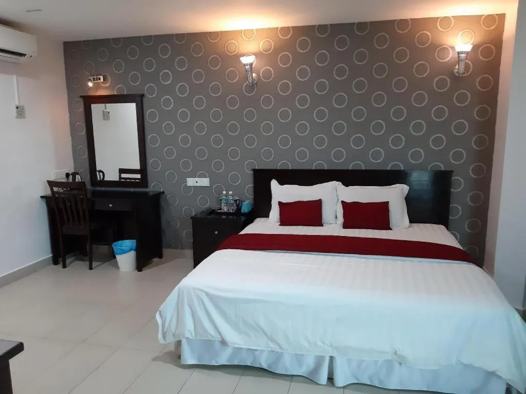 Bed in Loong Fatt Hotel