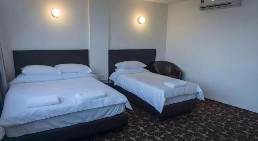 Bed in Riverine Garden Hotel