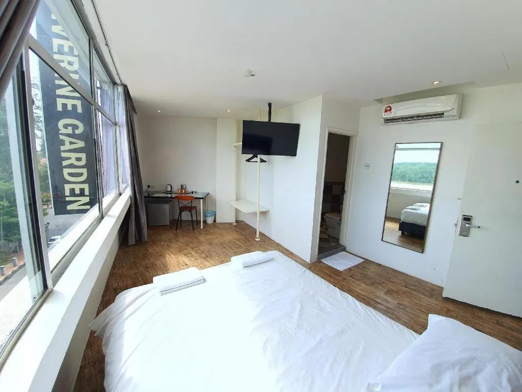 Bed in Riverine Garden Hotel