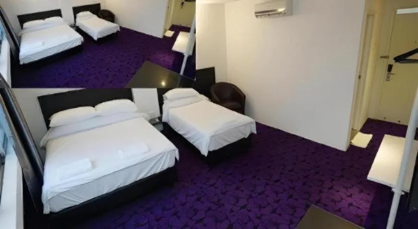 Bed in Riverine Garden Hotel