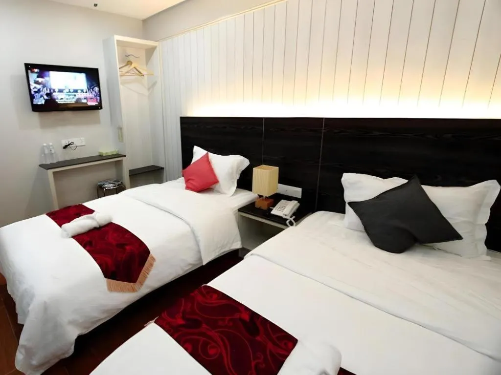 Bed in Grand SH Hotel