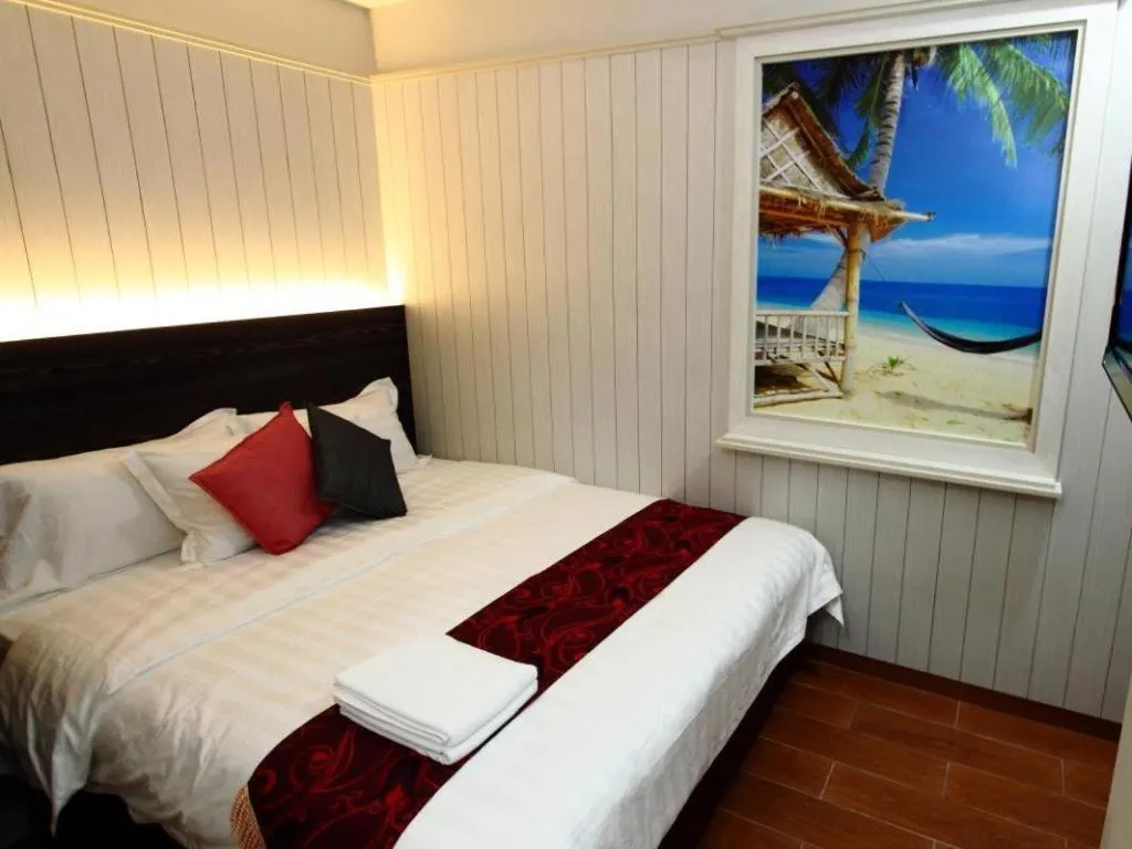 Bed in Grand SH Hotel