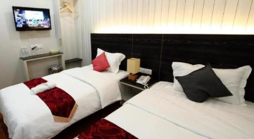 Bed in Grand SH Hotel