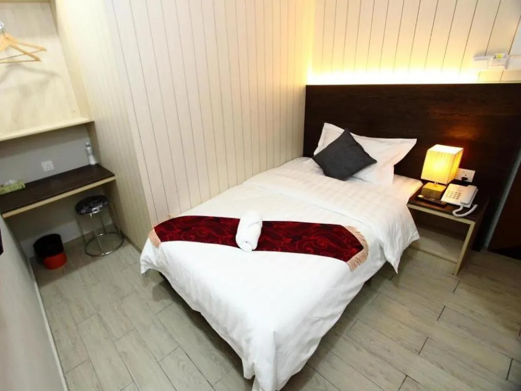 Bed in Grand SH Hotel