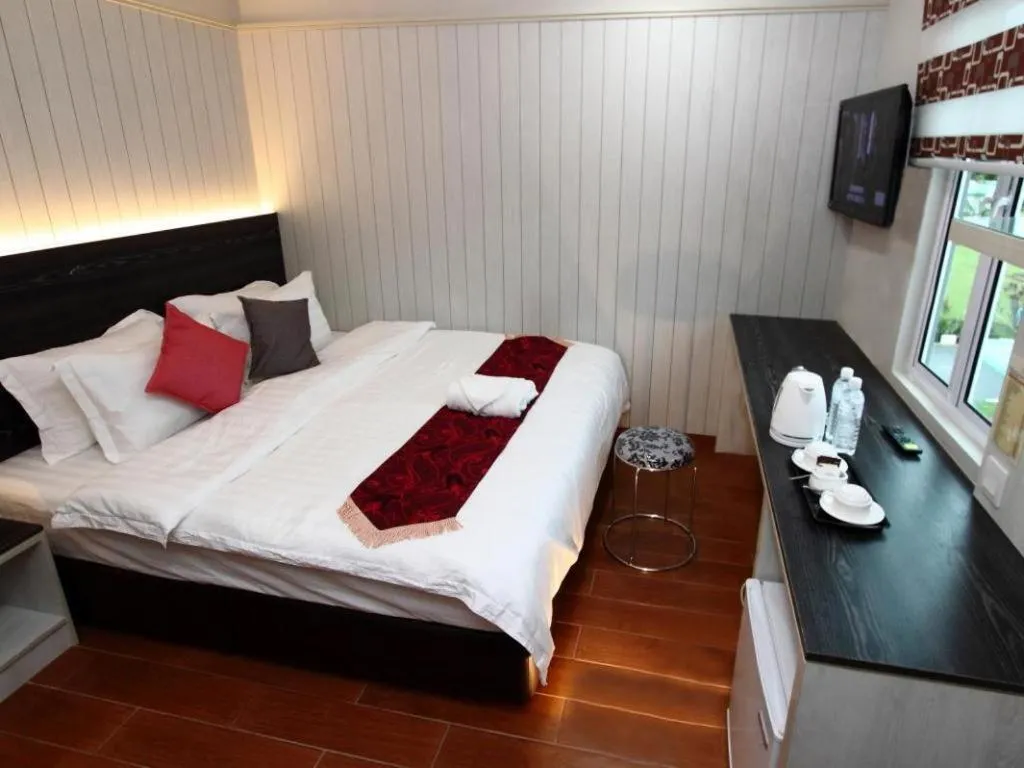 Bed in Grand SH Hotel