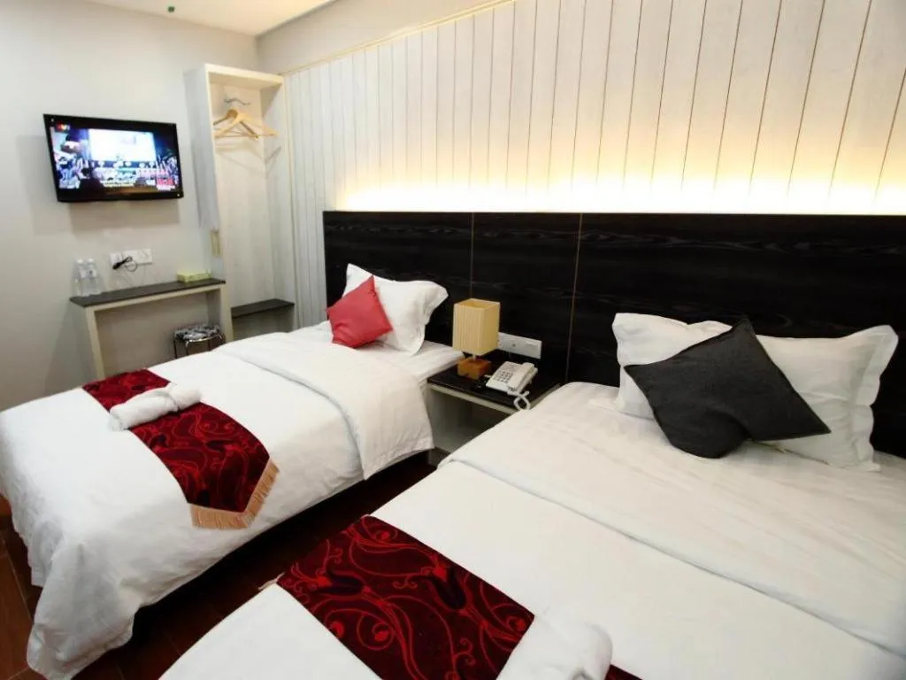 Bed in Grand SH Hotel