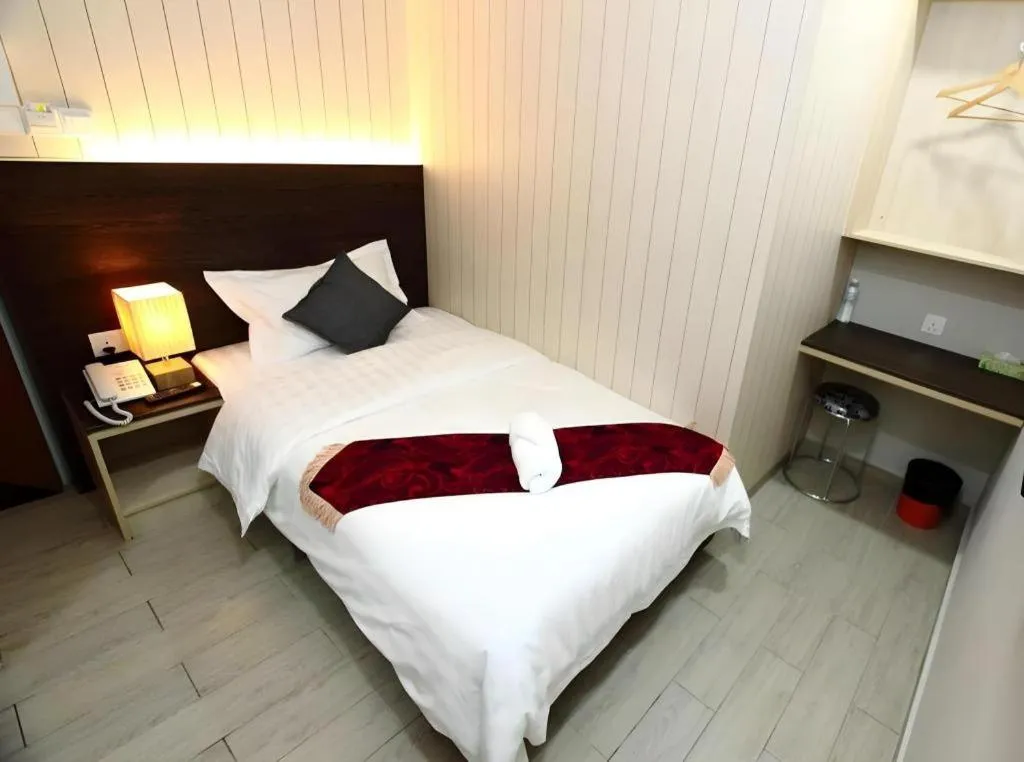 Bed in Grand SH Hotel