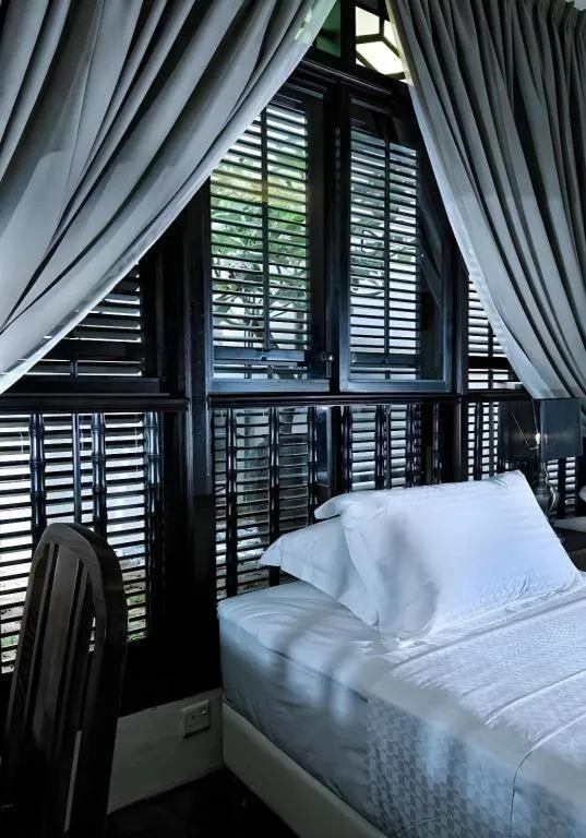 Bed in Courtyard at Heeren Boutique Hotel