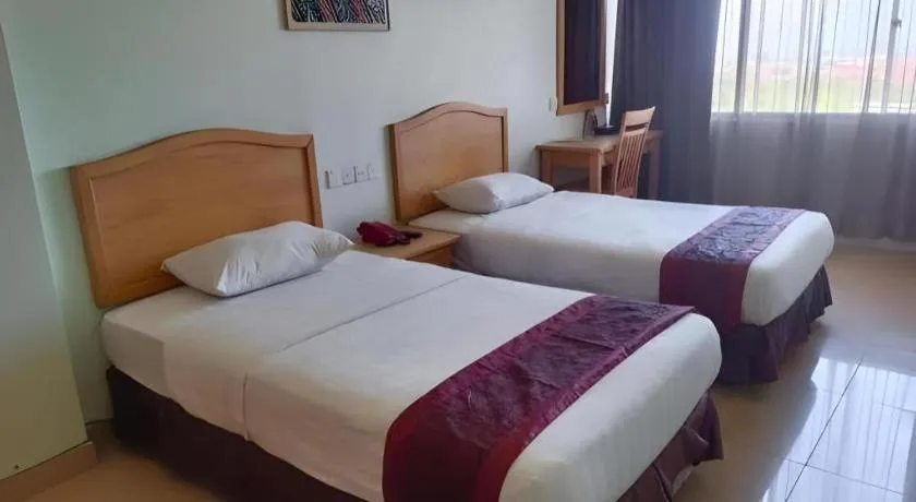 Bed in Li Hua Hotel Bintulu
