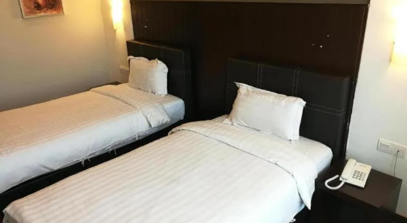 Bed in Kemena View Hotel Kuching (formerly known Merchant Hotel Kuching)
