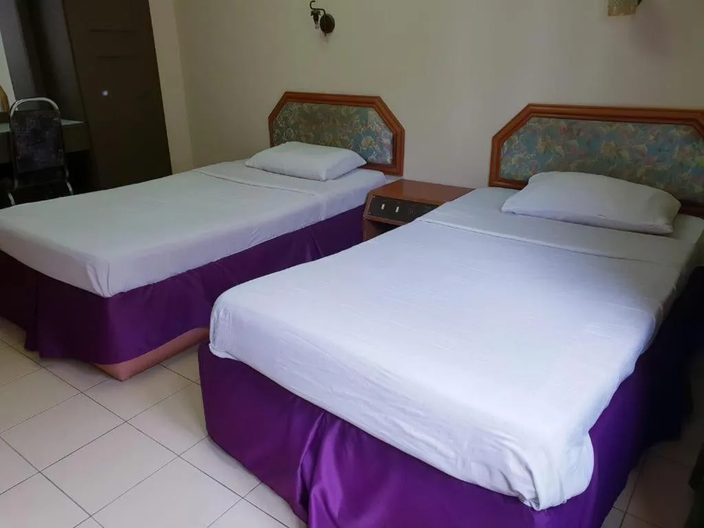 Bed in Champcity Hotel Sdn Bhd