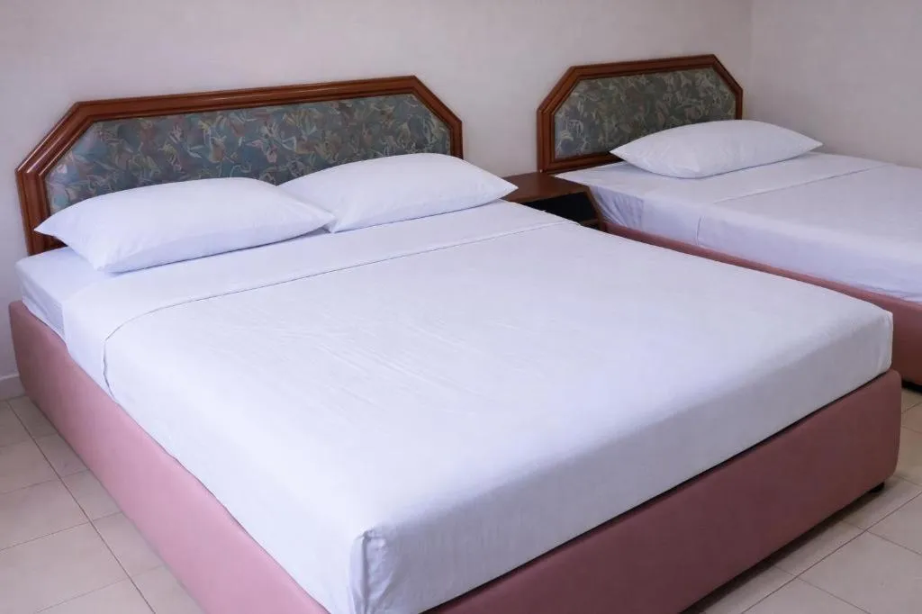 Bed in Champcity Hotel Sdn Bhd