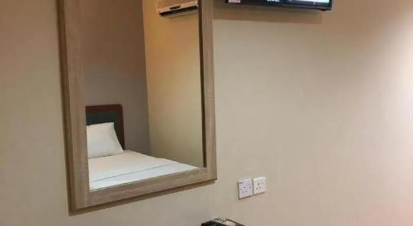 Bed in Hotel Perdana