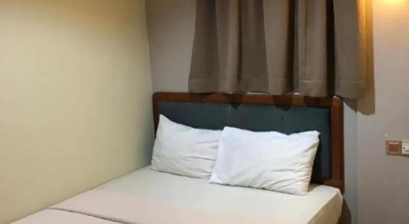 Bed in Hotel Perdana