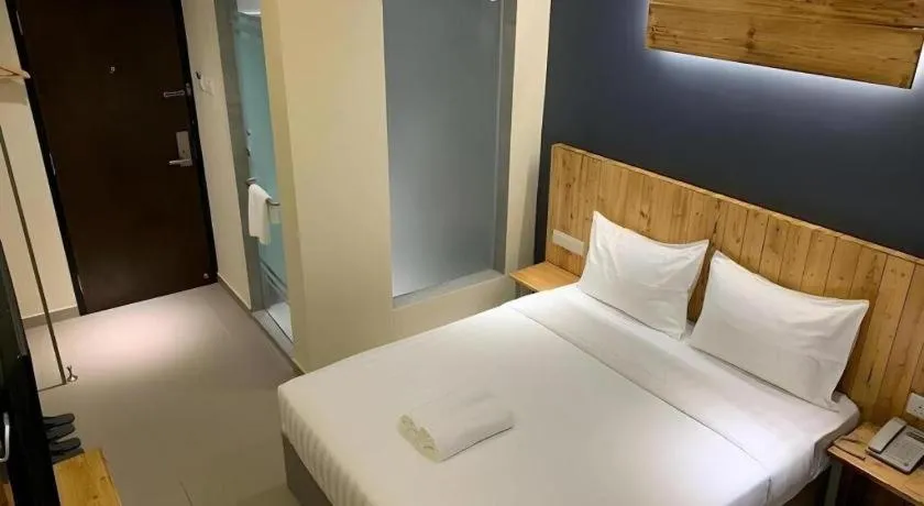 Bed in TLJ HOTEL