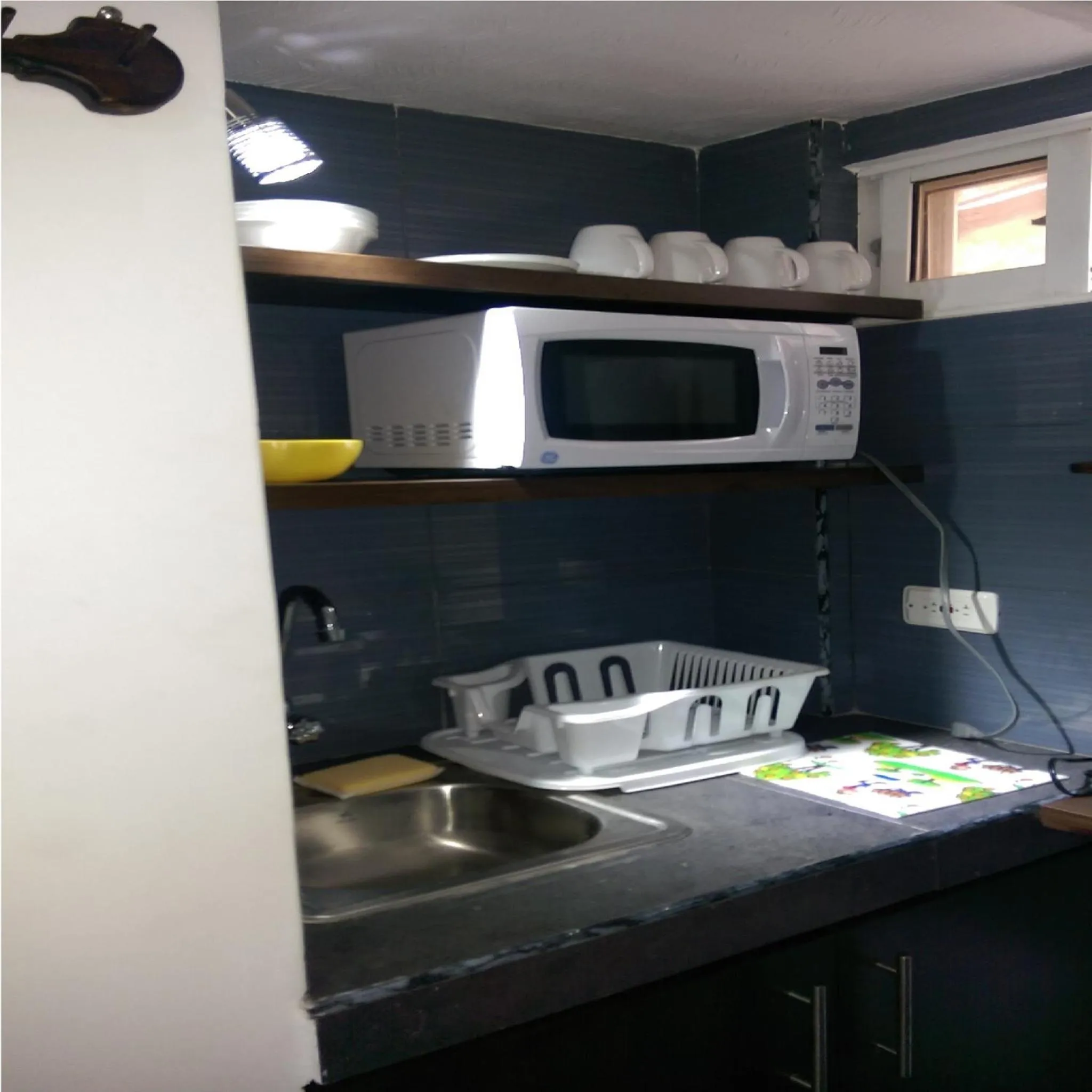 Kitchen or kitchenette in Hospedaje Solymar II Sarie Bay