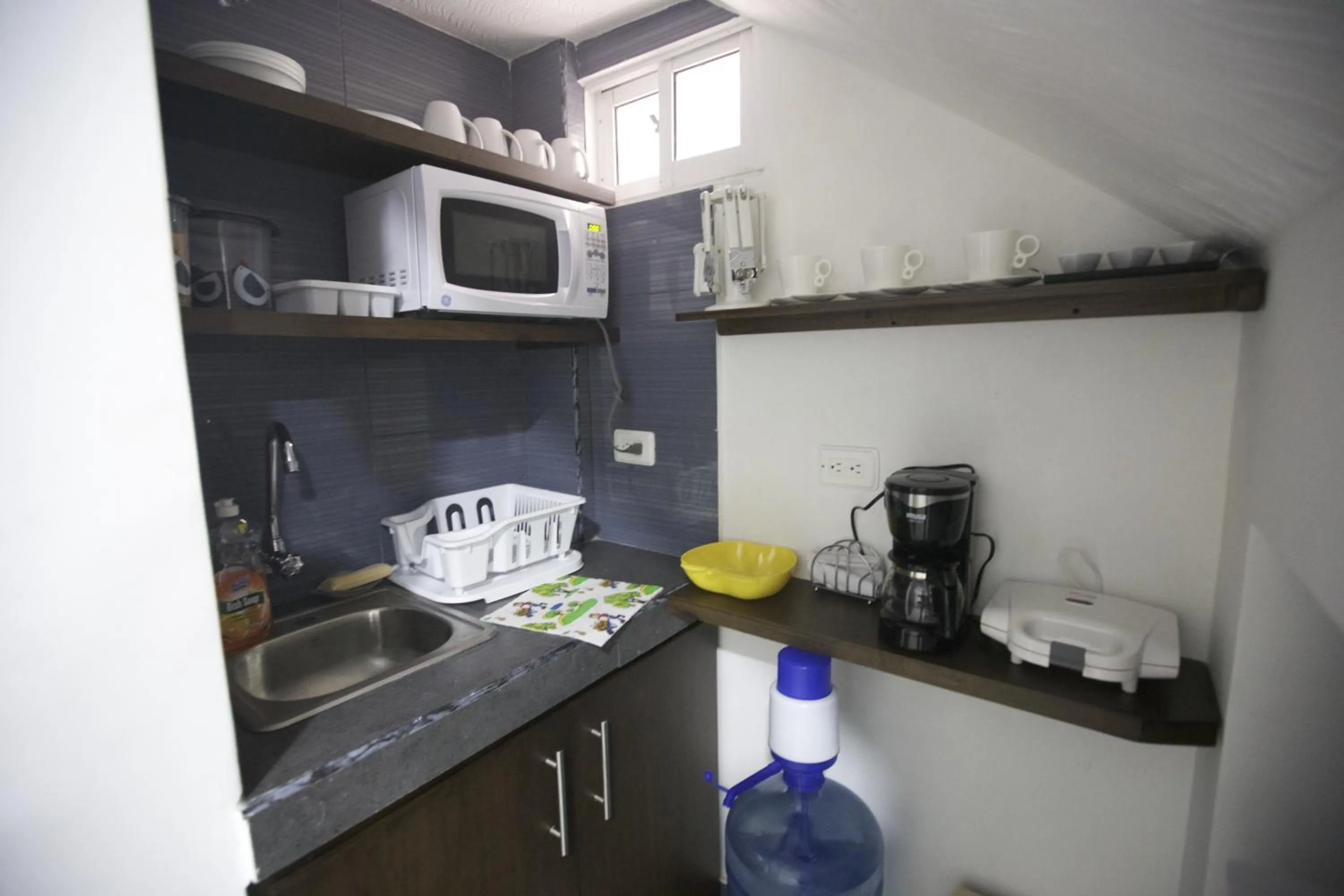 Communal kitchen in Hospedaje Solymar II Sarie Bay