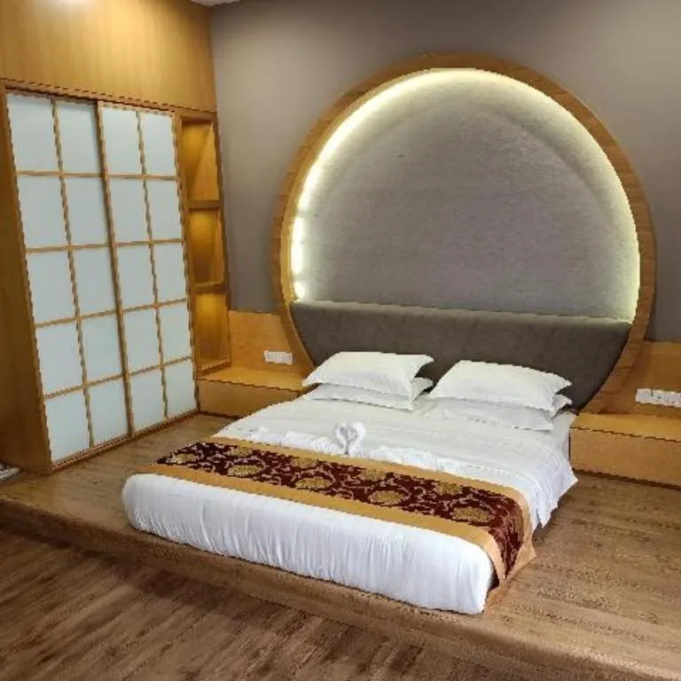 Bed in M GLOBAL HOTEL