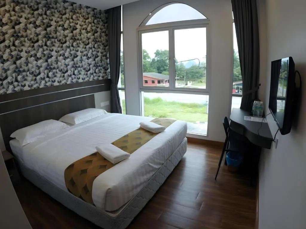 Bed in HOTEL KAWAN BIDOR
