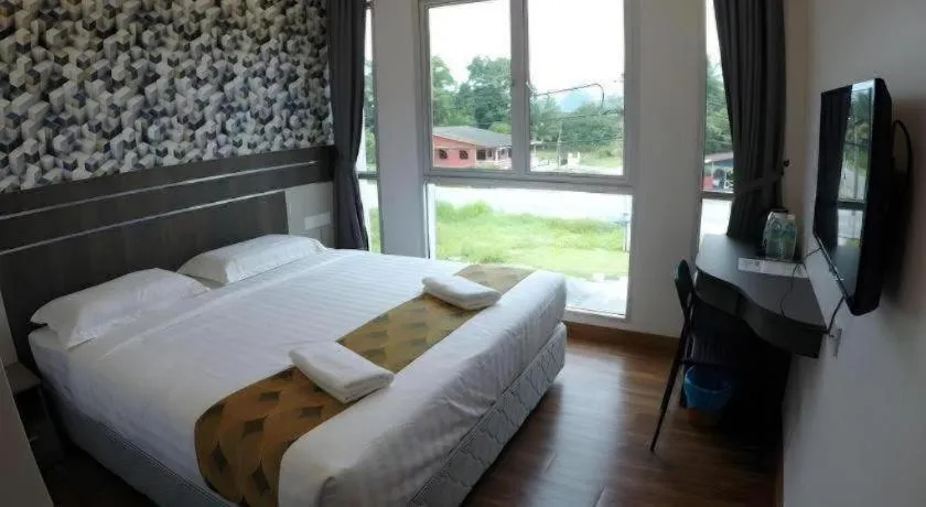 Bed in HOTEL KAWAN BIDOR