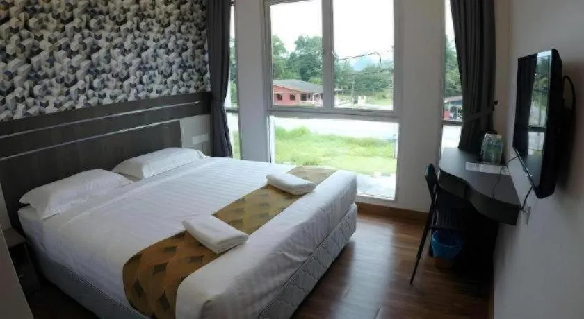 Bed in HOTEL KAWAN BIDOR