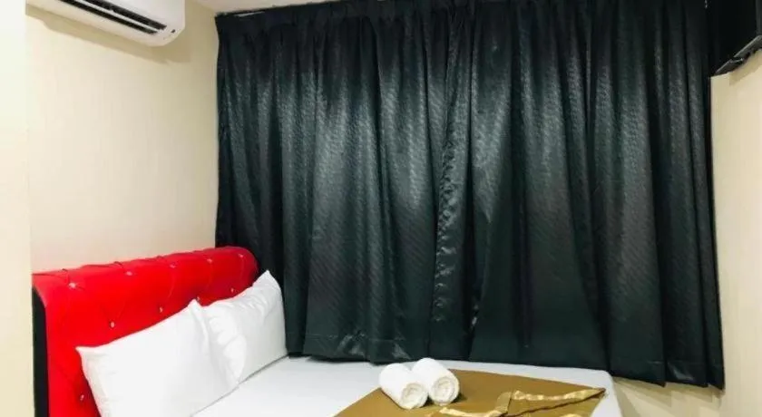 Bed in GEORGETOWN @ NEW WAVE HOTEL