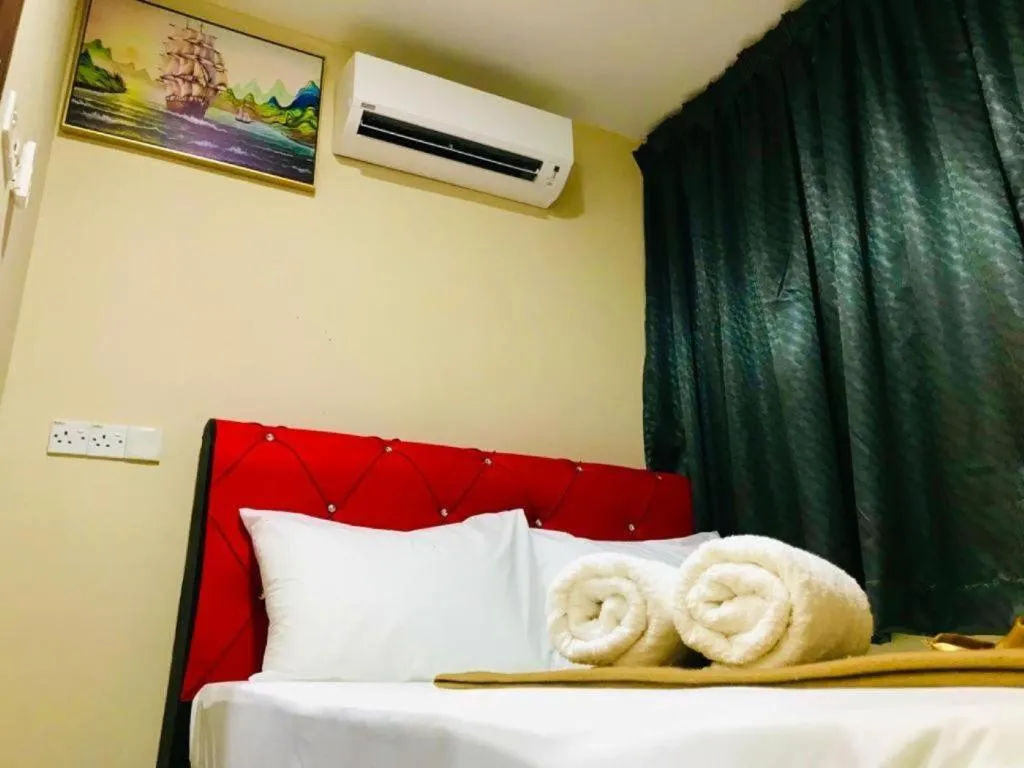 Bed in GEORGETOWN @ NEW WAVE HOTEL