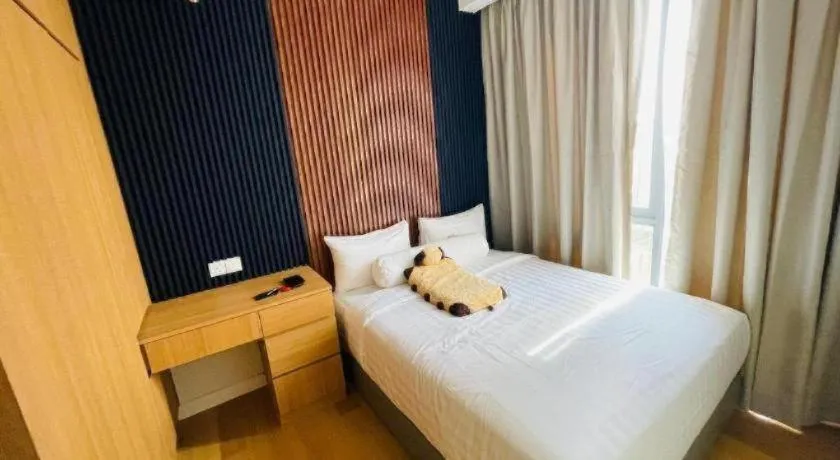 Bed in Sentral Suites By Eassy Hotel