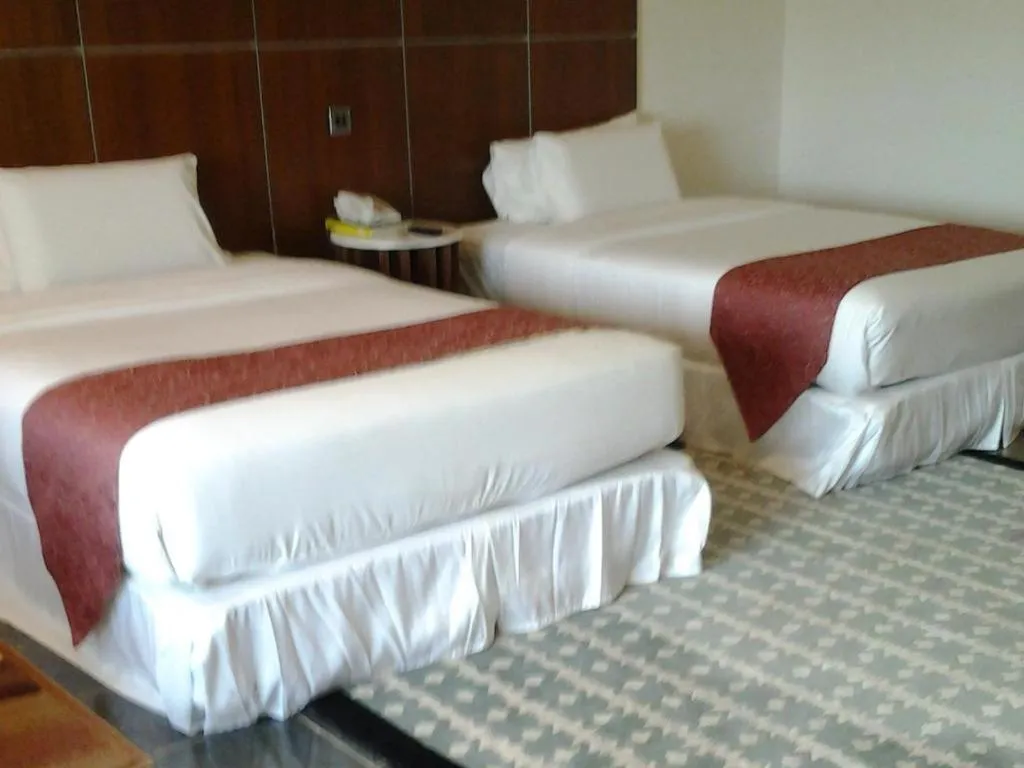 Bed in Century Helang Hotel