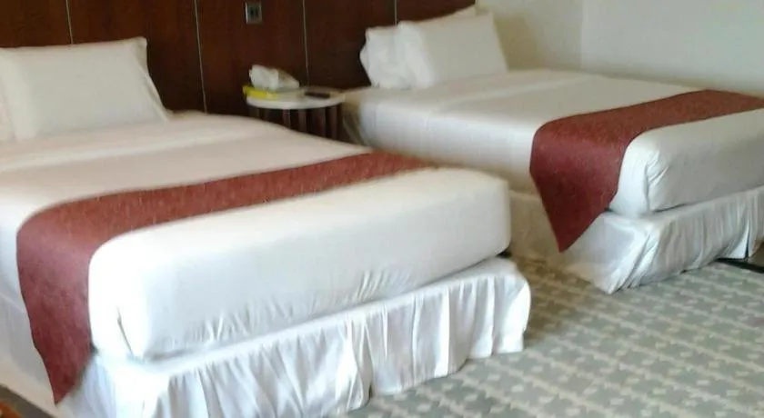 Bed in Century Helang Hotel