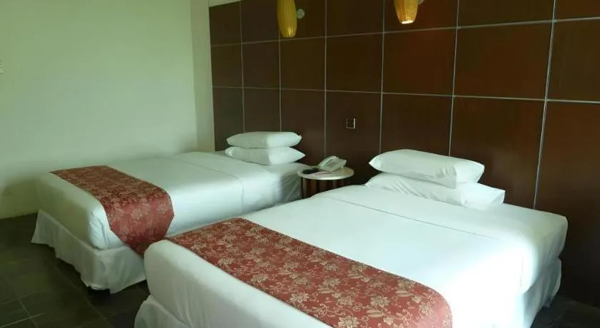 Bed in Century Helang Hotel