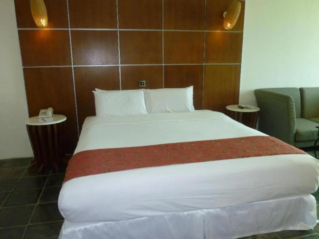 Bed in Century Helang Hotel