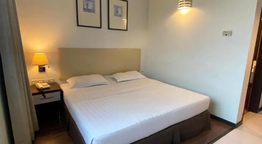 Bed in Ritz Garden Hotel