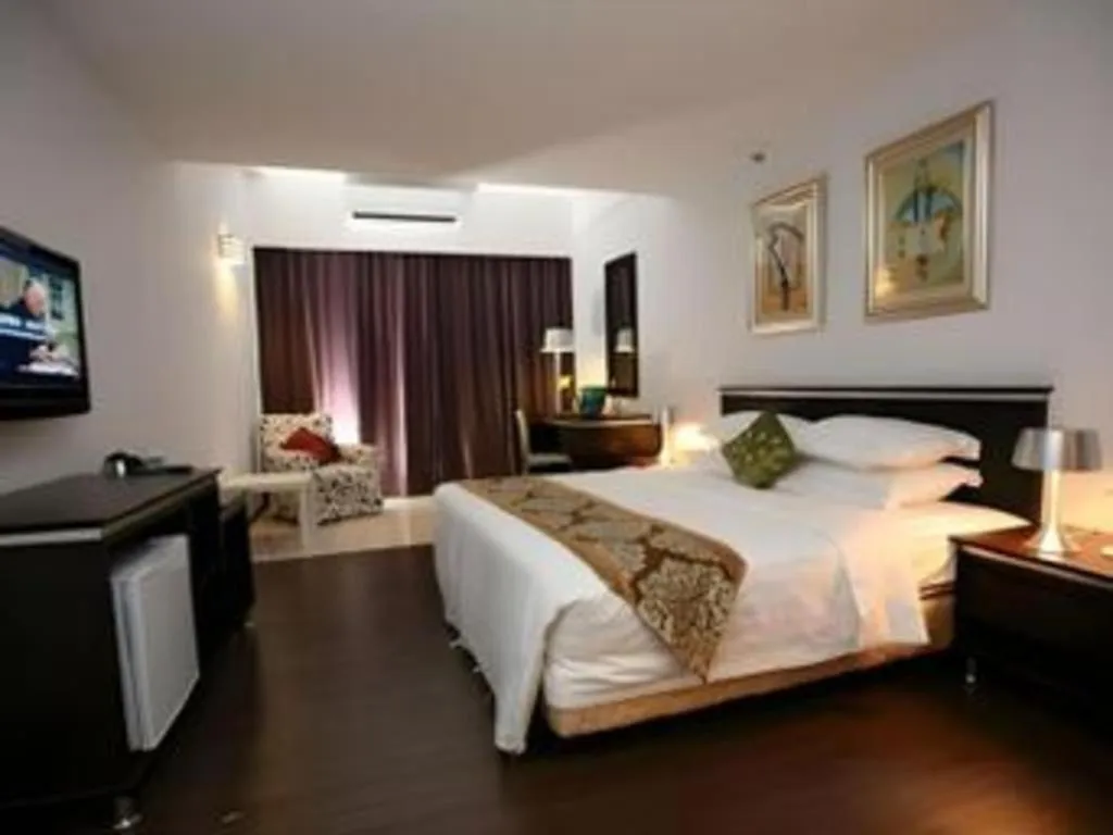 Bed in Ritz Garden Hotel