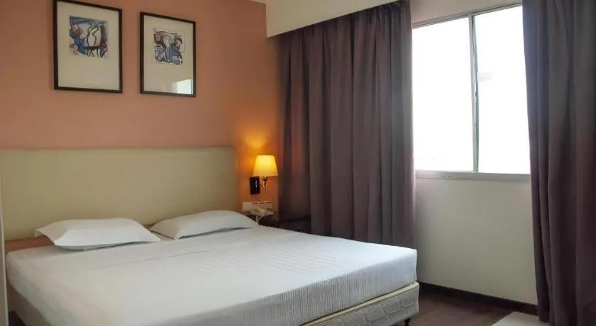 Bed in Ritz Garden Hotel