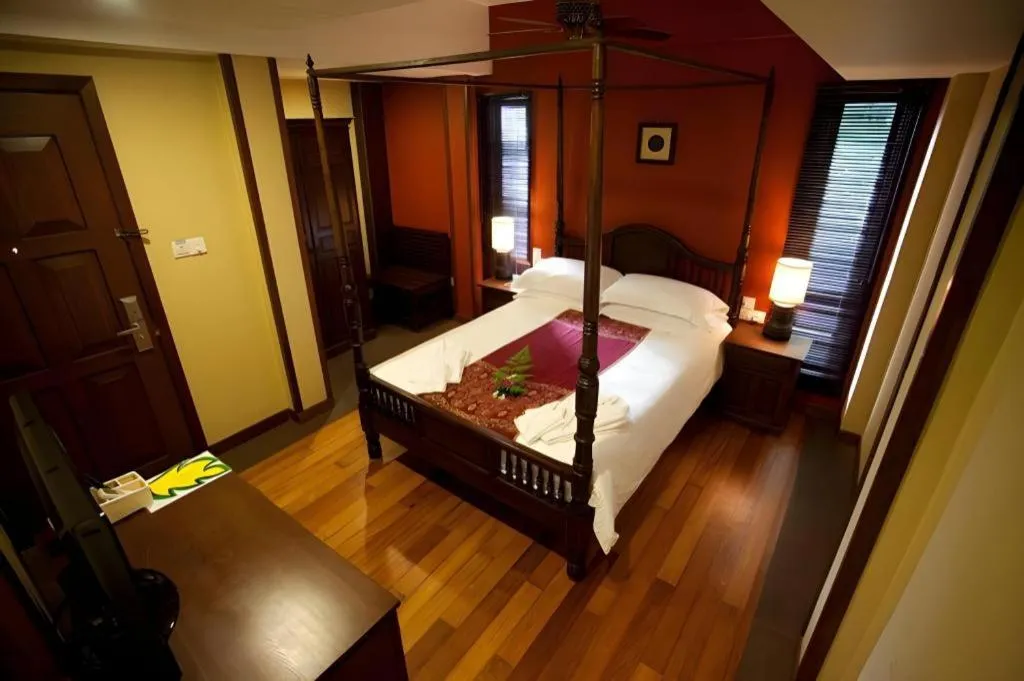Bed in Anggun Boutique Hotel