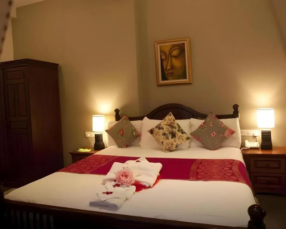 Bed in Anggun Boutique Hotel