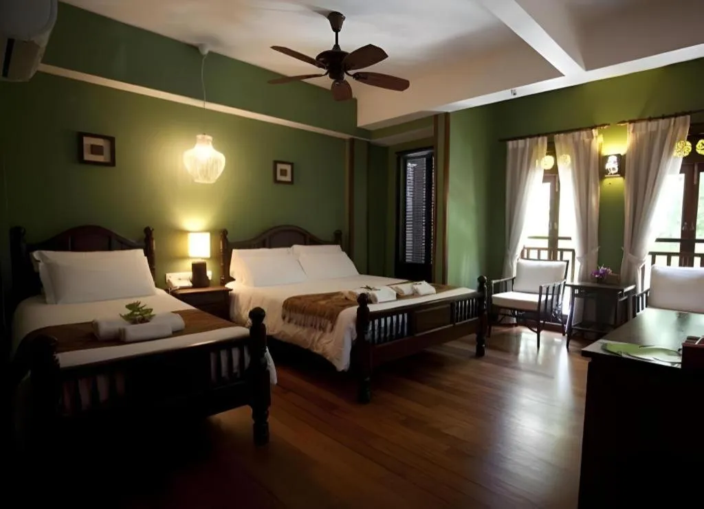 Bed in Anggun Boutique Hotel